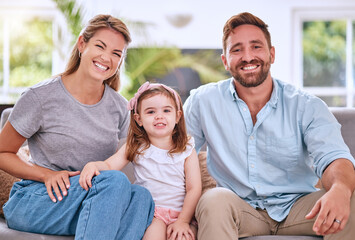 Happy family portrait, girl kid and parents on living room sofa, couch and relax together for love, care and quality time in Australia. Smile mom, dad and young child in lounge, family home and house