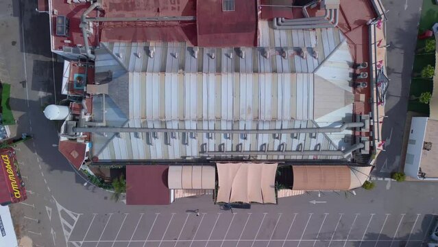 Get high party location. Buttery soft aerial view flight vertical 9:16 bird's eye view drone
of ibiza discotheque at daytime summer 2022. 4k marnitz Cinematic