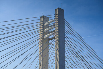 Obraz premium Architecture detail view of Basarab landmark bridge from Bucharest, Romania, during a beautiful sunny morning with blue sky. Travel to Bucharest.