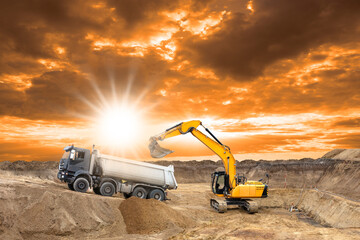 excavator is working and digging at construction site