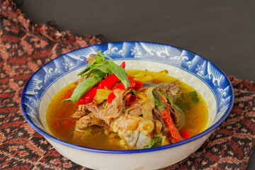Yellow gravy fish curry. Cooked with a variety of spices, savory and delicious taste.