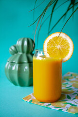 Fresh delicious orange juice on a bright background, summer mood