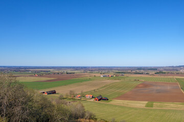 Fototapeta na wymiar Aerial view of rural landscape in spring with a farm