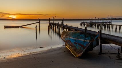 Dilapidated Old blue boat at Velddrif between the fishing jetties 
