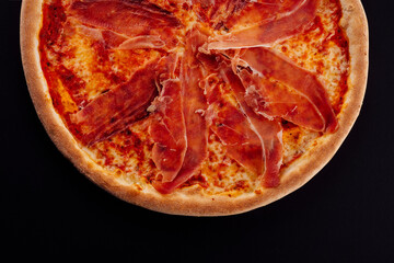 Pizza with prosciutto, cheese, tomato sauce