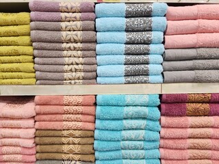 Closed Up Colourful Towel that neatly arranged.