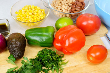 Salad texas caviar. Vegetable dish with corn, beans, pepper, pepper, tomatoes, beans. Served with corn chips nachos