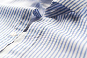 Close up of men's striped shirt. Copy space. 