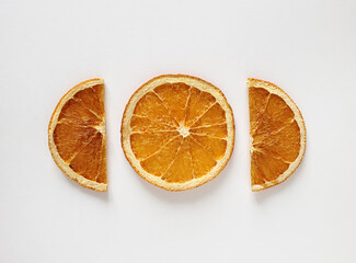Dried orange slices isolated on white background, top view, copy space.