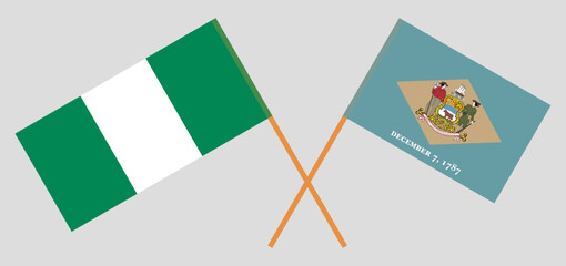 Crossed flags of Nigeria and The State of Delaware. Official colors. Correct proportion