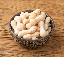 Traditional brazilian polvilho or starch biscuit on a bowl over wooden table