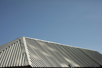 Roof is made of metal. Steel roof. Details of building.