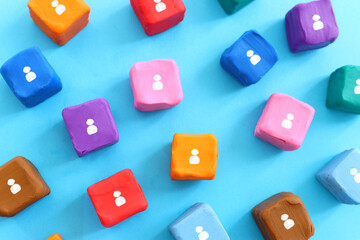 business concept image of plasticine blocks with people icons ,human resources and management...