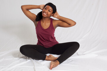 Happy woman stretching before exercise