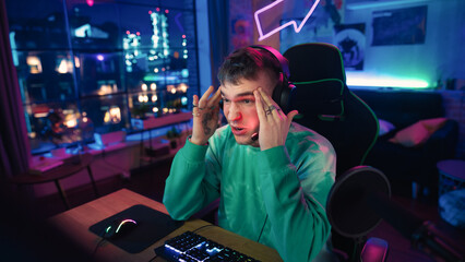 Upset Streamer Talking and Entertaining Followers During Live Broadcast Online. Stylish Young Man...