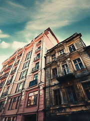 Fototapeta premium Two houses, old and new next to each other. vertical. Illustration