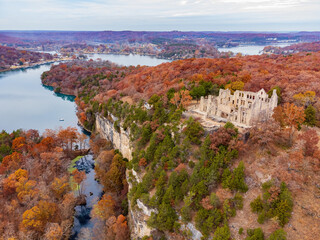 Aerial view of the fall color of Lake Ozark and the castle ruins