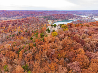 Aerial view of the fall color of Lake Ozark and the castle ruins
