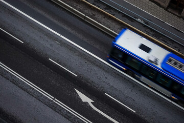 public transport bus on road from above in Stockholm in rush hour commuting time on the way to work