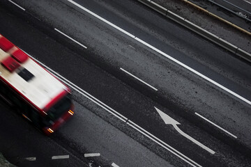 public transport bus on road from above in Stockholm in rush hour commuting time on the way to work