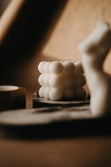 A candle burned on the table