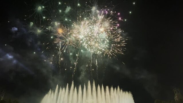 Brilliantly colored fireworks display. Celebrating the new year 2024. 4k video. Christmas time. 