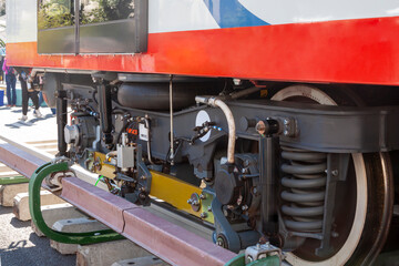 Train stop gear with steam locomotive detail, cranks, wheels and braking system with energy transmission.