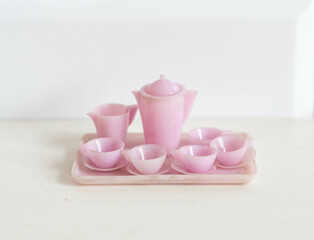 Miniature plastic coffee or tea set for a dollhouse