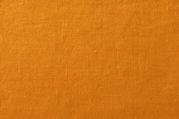 Linen yellow canvas background textile texture.