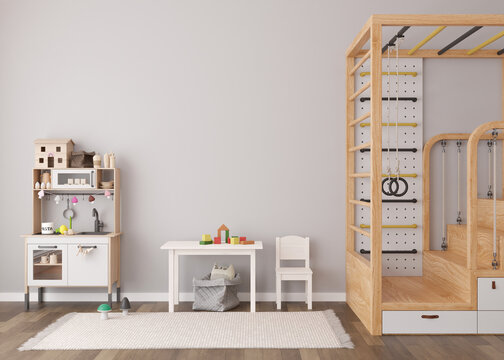 Empty gray wall in modern child room. Mock up interior in contemporary, scandinavian style. Copy space for your artwork, picture or poster. Bed, table with chair, toys. Cozy room for kids. 3D render.