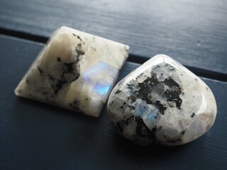 Moonstone with Black and Rainbow Inclusions - obrazy, fototapety, plakaty