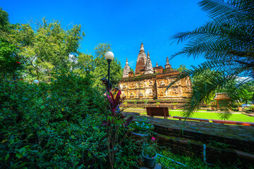 Wat Chet Yot or Wat Photharam Maha Wihan, seven pagoda temple It is a major tourist attraction in Chiang Mai, Thailand.with evening,Temple in Chiang Mai.