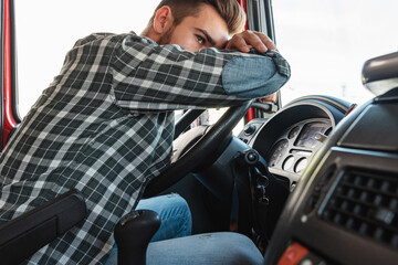 Tired truck driver feeling sleepy and sick