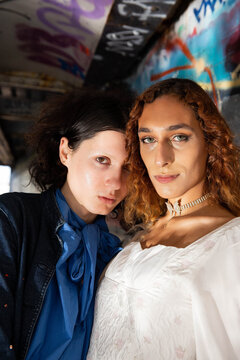 Two transgender friends posing.