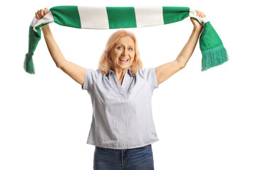 Mature woman holding a green and white scarf up