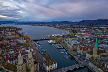 Aerial view of City of Zürich with the old town and Limmat River on a cloudy autumn late afternoon. Photo taken November 4th, 2022, Zurich, Switzerland.