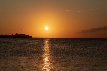 sunset on the beach, dusk with sea and sand