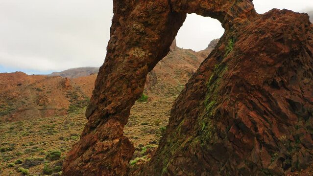 Queen Shoe. Geological feature in Teide National Park. Tenerife, Spain. Hole in mountain rock formation. Volcanic deserted hiking area. Canary Island.