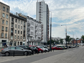 Fototapeta na wymiar Different modern cars parked on city street
