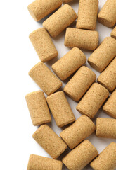 Wine bottle corks on white background, top view