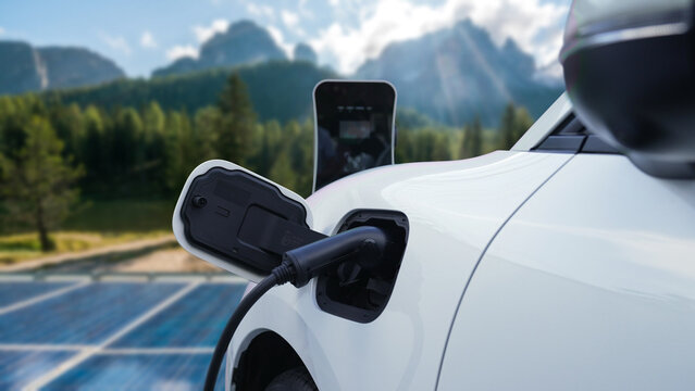 Concept Of Progressive Future Renewable And Clean Energy Technology By Charging Station Recharge EV Car's Battery Powered By Solar Cell For Eco-friendly Sustainable Energy System.