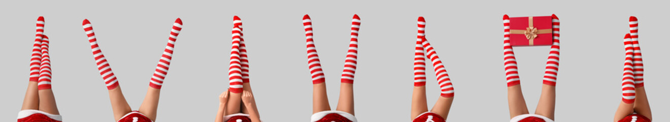 Many legs of sexy young women in Christmas stockings on light background