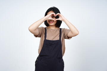 Obraz premium Showing Love Heart Sign of Beautiful Asian Woman Isolated On White Background