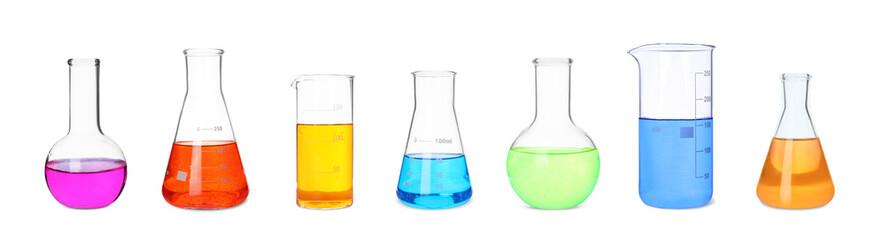 Set of different laboratory glassware with colorful liquids on white background. Banner design