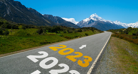 2023 New Year road trip travel and future vision concept . Nature landscape with highway road...