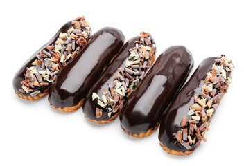 Delicious eclairs in chocolate glaze isolated on white background