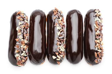 Delicious eclairs in chocolate glaze isolated on white background