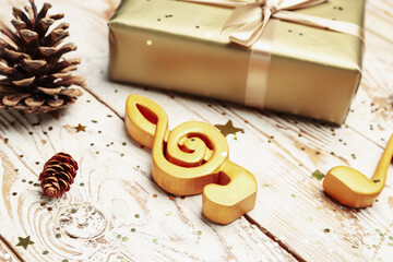 Violin clef on light wooden background, closeup