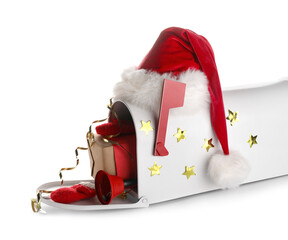 Mailbox with Santa hat, gift, mittens and Christmas bell on white background