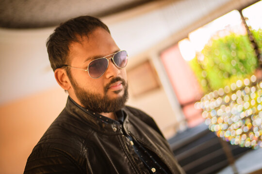 Middle age beard Indian Man posing for the camera